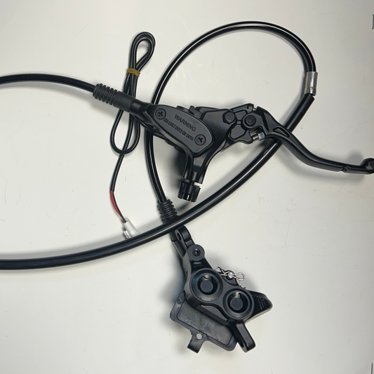 Bicycle brake cable and housing on a white background
