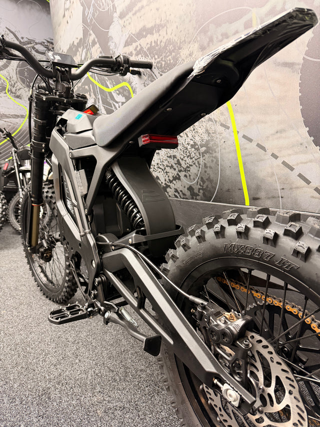 Close-up of a dirt bike with a blurred background