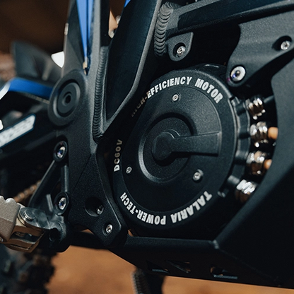Close-up of a motorcycle's efficiency motor with visible branding.