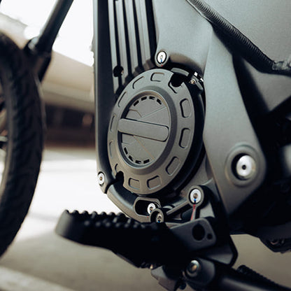 Close-up of a motorcycle engine and exhaust system