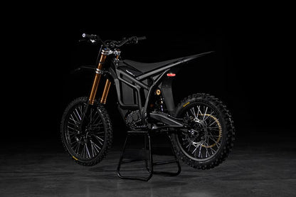 Black electric bike on a dark background